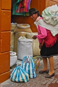 Woman on street of old town Quito